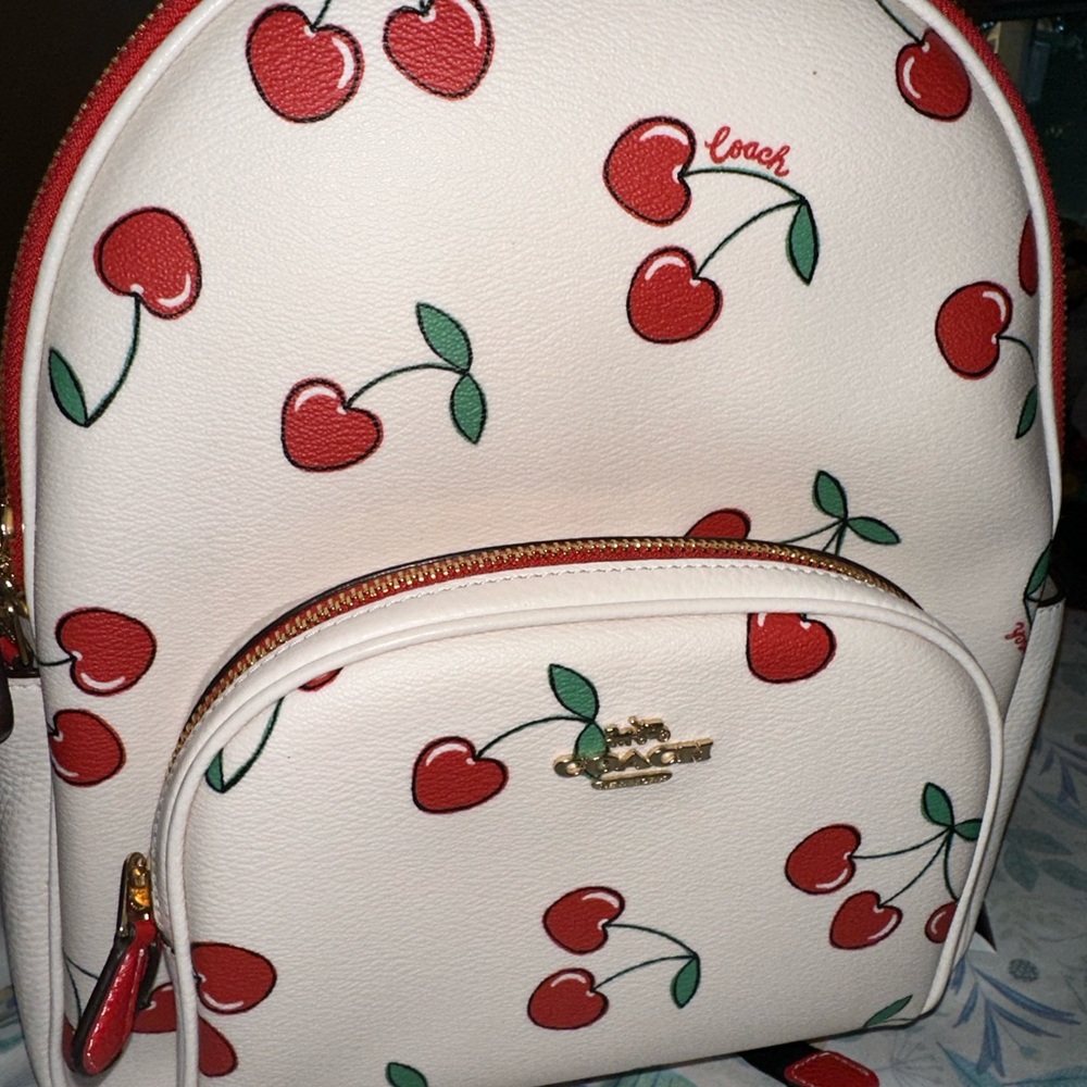 Cherry Coach backpack in good condition missing coach tag